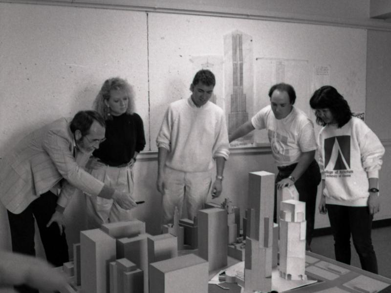 Several students and model buildings